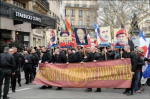 Members of the extreme right-wing organisation 'La Troisieme Voie' protest against US imperialism on February 2 2013 in Paris.  